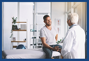 A patient talking with his doctor